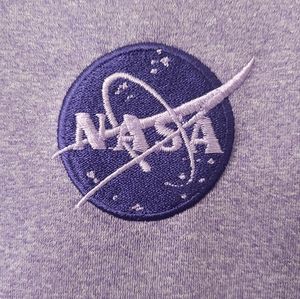 Ladies large, long sleeve quarter zip shirt. NASA embroidered logo.